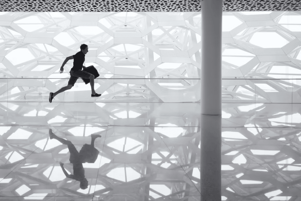 man running across tiled floor urgently