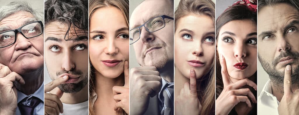 Group of seven people doing thinking faces with hand near their face